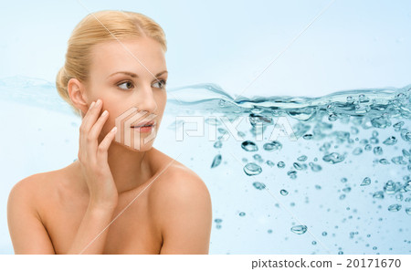 young woman touching her face 20171670