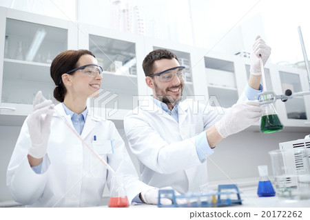 young scientists making test or research in lab young scientists making test or research in lab 20172262