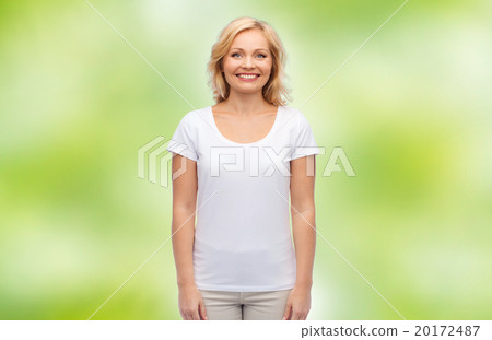 smiling middle aged woman in blank white t-shirt smiling middle aged woman in blank white t-shirt 20172487