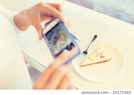 woman hands with smartphone taking food picture woman hands with smartphone taking food picture 20172488