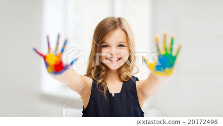 girl showing painted hands girl showing painted hands 20172498