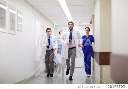 group of medics walking along hospital group of medics walking along hospital 20172705