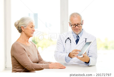 senior woman and doctor with tablet pc 20172797