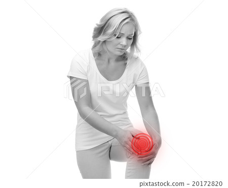 unhappy woman suffering from pain in leg unhappy woman suffering from pain in leg 20172820