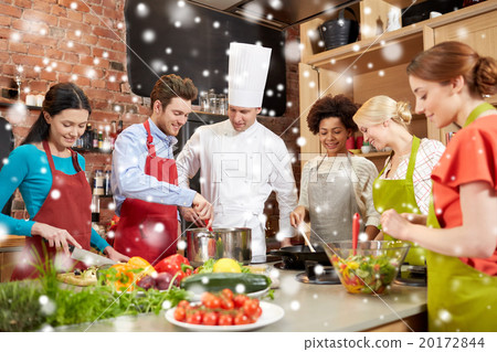 happy friends and chef cook cooking in kitchen 20172844