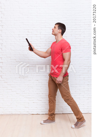 Casual Man Using Tablet Computer Busy Go Look Up Casual Man Using Tablet Computer Busy Go Look Up 20173220