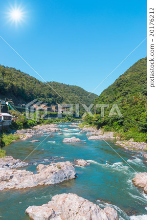 Water flowing over rocks Between two mountains Water flowing over rocks Between two mountains 20176212