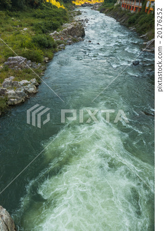 Water flowing over rocks on top view. Water flowing over rocks on top view. 20176252