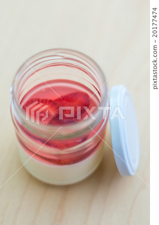 Beautiful strawberry dessert in jar on light Board 20177474