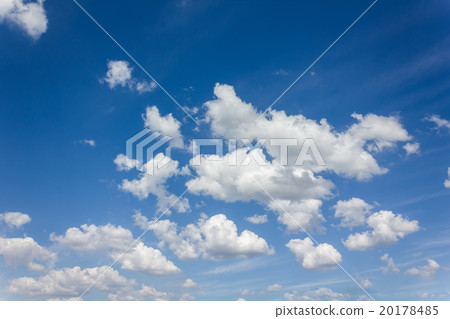 Beautiful light blue sky with puffy white clouds Beautiful light blue sky with puffy white clouds 20178485