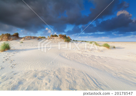 sand dune and blue sky by sea sand dune and blue sky by sea 20178547