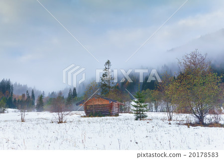 wooden hut on snow in alps 20178583