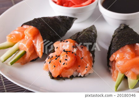 Temaki salmon on a plate close-up. horizontal 20180346
