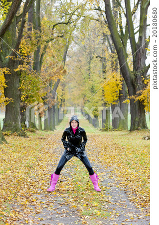 woman in autumnal alley 20180680