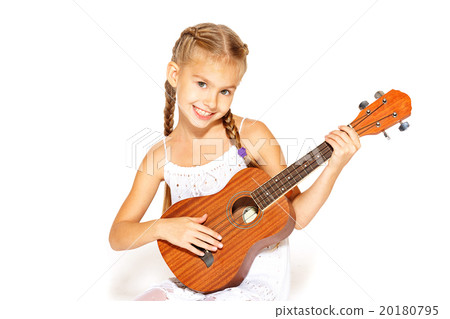 Beautiful little girl with a guitar  20180795