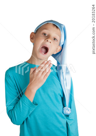 Cute boy in sleeping hat isolated on white 20183264