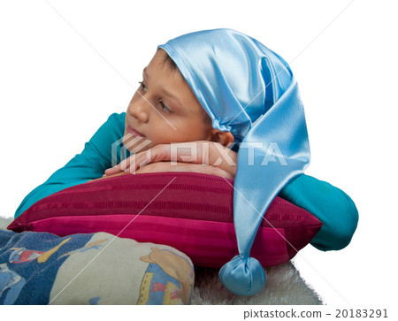 Cute boy laying on pillow isolated Cute boy laying on pillow isolated 20183291