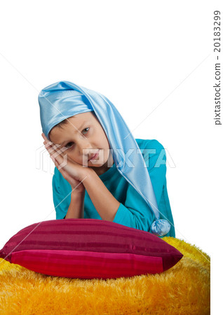 Cute boy near pillow isolated Cute boy near pillow isolated 20183299