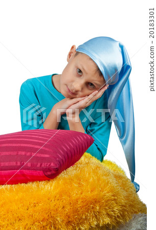 Cute boy near pillow isolated Cute boy near pillow isolated 20183301