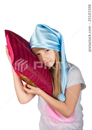 Cute girl with pillow isolated Cute girl with pillow isolated 20183306