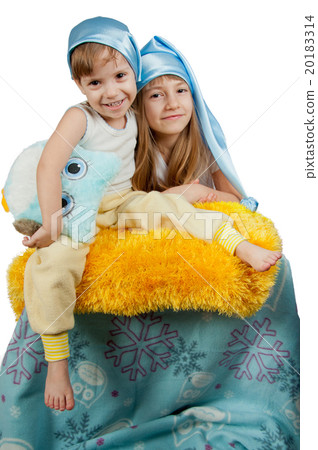 Cute girls in blue sleeping hats isolated on white 20183314