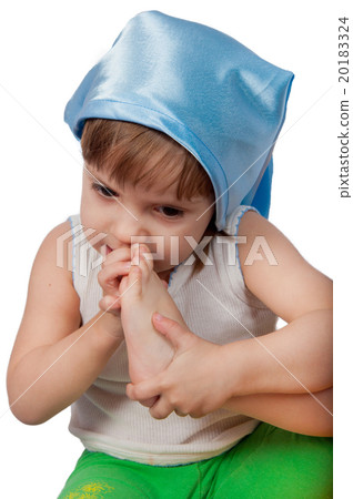 Cute girl in blue sleeping hat isolated on white 20183324