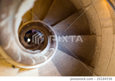 Close up view at narrow stone spiral stairway 20184556