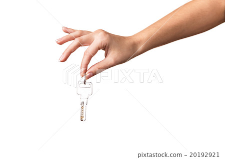 Woman's hand giving keys 20192921
