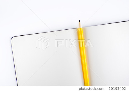 Open blank notebook with yellow pencil on white  20193402