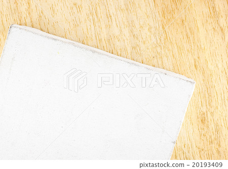 Top view of Blank old dirty canvas on wood table Top view of Blank old dirty canvas on wood table 20193409
