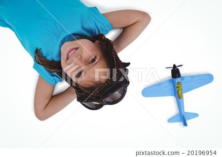 Smiling girl laying on the floor 20196954