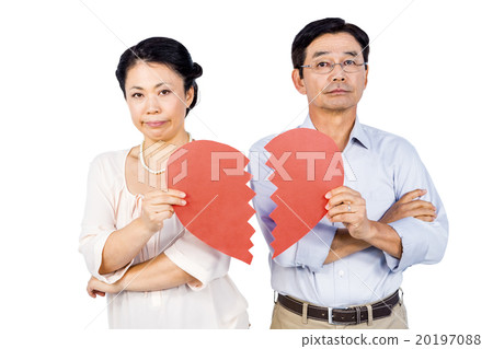 Couple holding broken heart Couple holding broken heart 20197088