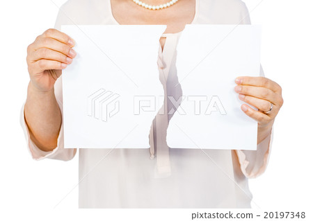 Woman holding ripped page 20197348
