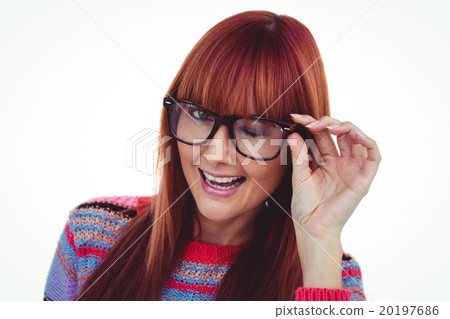 Smiling hipster woman doing a wink 20197686