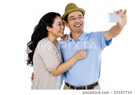 Man and woman taking a picture Man and woman taking a picture 20197734