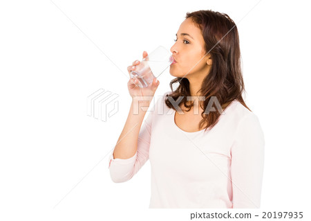 Gorgeous woman drinking a glass of water Gorgeous woman drinking a glass of water 20197935