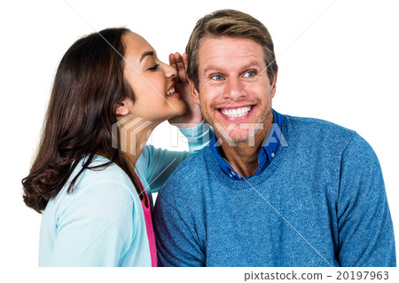 Woman sharing secret with man 20197963