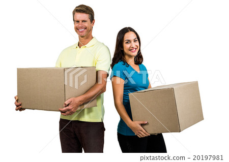Couple holding boxes against white background 20197981