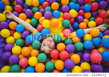 Cute smiling boy in sponge ball pool Cute smiling boy in sponge ball pool 20198212