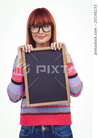 Smiling hipster woman holding blackboard Smiling hipster woman holding blackboard 20198233