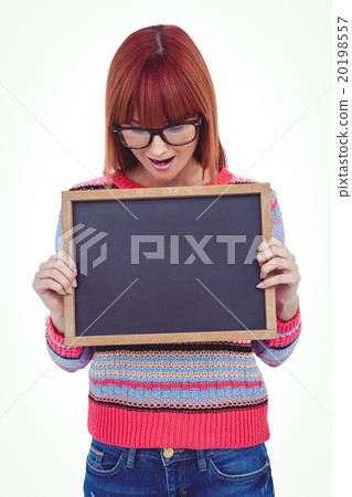 Smiling hipster woman holding blackboard Smiling hipster woman holding blackboard 20198557
