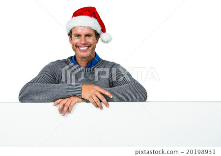Happy man wearing Santa hat Happy man wearing Santa hat 20198931