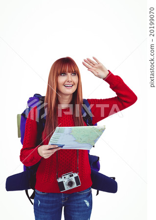 Smiling hipster woman with a travel bag with a map 20199070