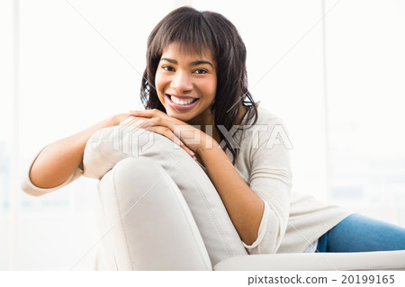Pretty woman smiling at camera  20199165