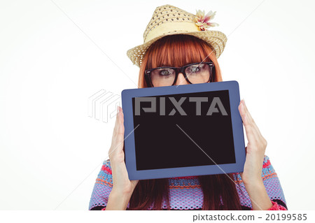 Attractive hipster woman behind a tablet 20199585