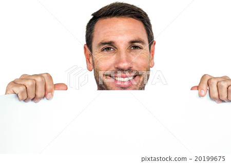 Smiling man holding blank sheet 20199675