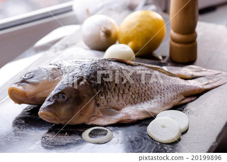 fresh carp fish with spices and lemon 20199896