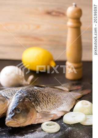 fresh carp fish with spices and lemon 20199897