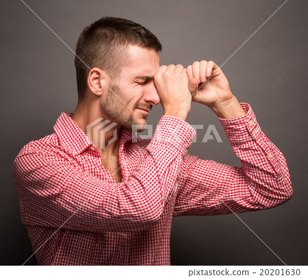 Man making binocular or tube from hands 20201630