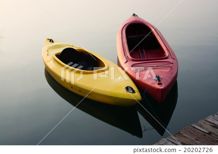 Yellow and Red Kayak on the lake 20202726